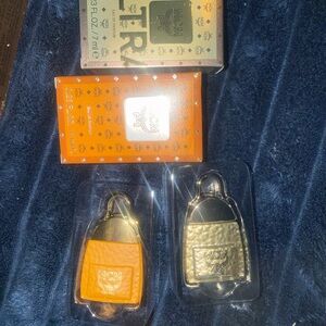 MCM Orange and Gold Mini Bag Charm Set